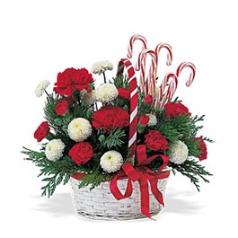 A festive basket of flowers and candy canes